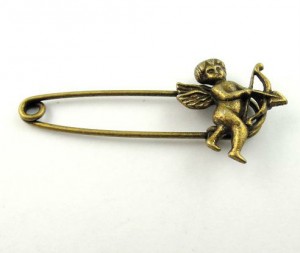 1 broche speld met CUPIDO, bronskleurig tibetaans zilver,50x24x9mm