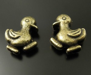 54 bronskleurige 3d kralen tibetaans zilver, EEND 13x11x4mm