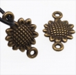 BRONSkleurige connector tibetaans zilver, zonnebloem 14x7mm