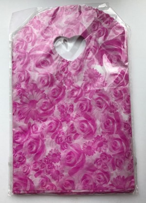 50 plastic tasjes, met roze BLOEMen print 21x13cm	