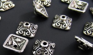 70 kralenkapjes tibetaans zilver! 10x4,5mm