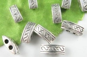 20 tibetaans zilveren kralen, met 2 rijgopeningen, 9,5x4mm