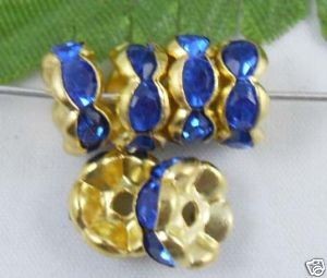 100 x vergulde rondel met blauwe strass, 8mm