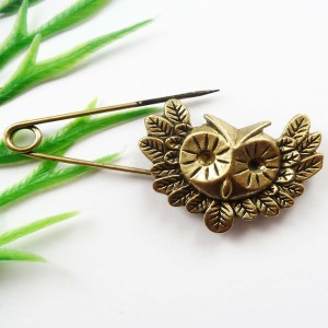 1 broche speld met uil, bronskleurig tibetaans zilver,61x29mm