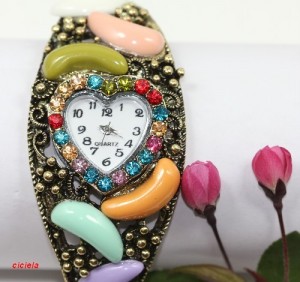 1 klembandhorloge met kristal